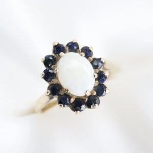 Złoty Pierścionek 9K (p.375) Halo z Opalem i Szafirami, r. 10